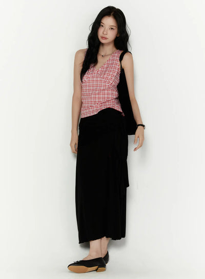 LEWKIN Draped Wrap Maxi Skirt CL520 Black front shot on model wearing red gingham tank and black flats, standing against white wall