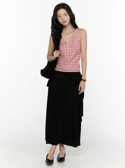 Draped Wrap Maxi Skirt CL520 Black front shot on model holding black cardigan over shoulder, full-length styling with ballet flats