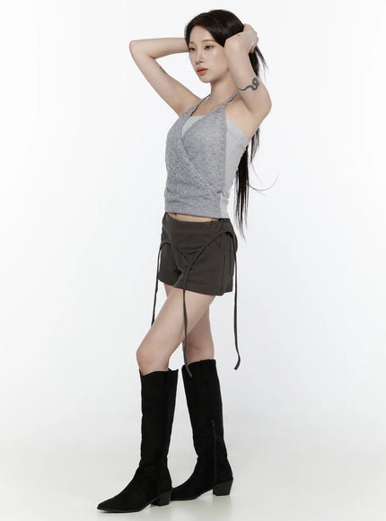 Drawstring Banded Shorts IL522 Dark gray side full-body view on model with arms raised behind head in gray lace halter top and black boots, straps draping down