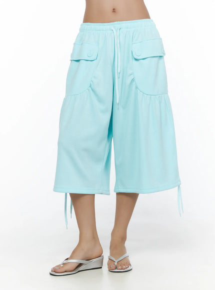 LEWKIN Drawstring Bermuda Shorts CL513 Mint S/M front shot on model wearing silver wedge flip-flops, elastic waistband with white drawstring, flap cargo pockets