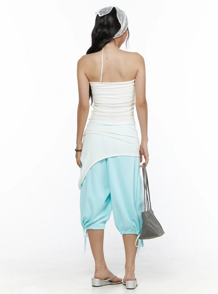 Drawstring Bermuda Shorts CL513 Mint back full outfit shot on model styled with white tube top, polka-dot head scarf, holding gray bag, showing ruched balloon hem and ties