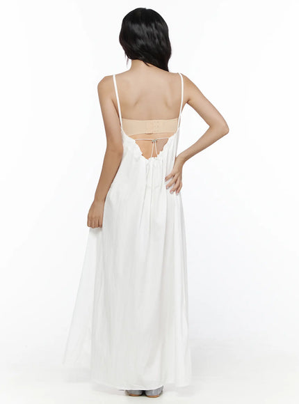 Drawstring Sleeveless Long Dress CL510 White back shot on model revealing open back drawstring tie deep cutout and floor-length flowing skirt