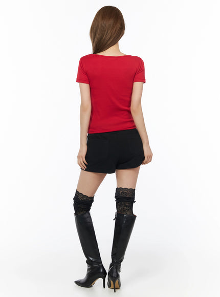 Drawstring Sweat Shorts IL502 Black back shot on model styled with red crop top showing clean back seam and lace thigh-high socks with boots