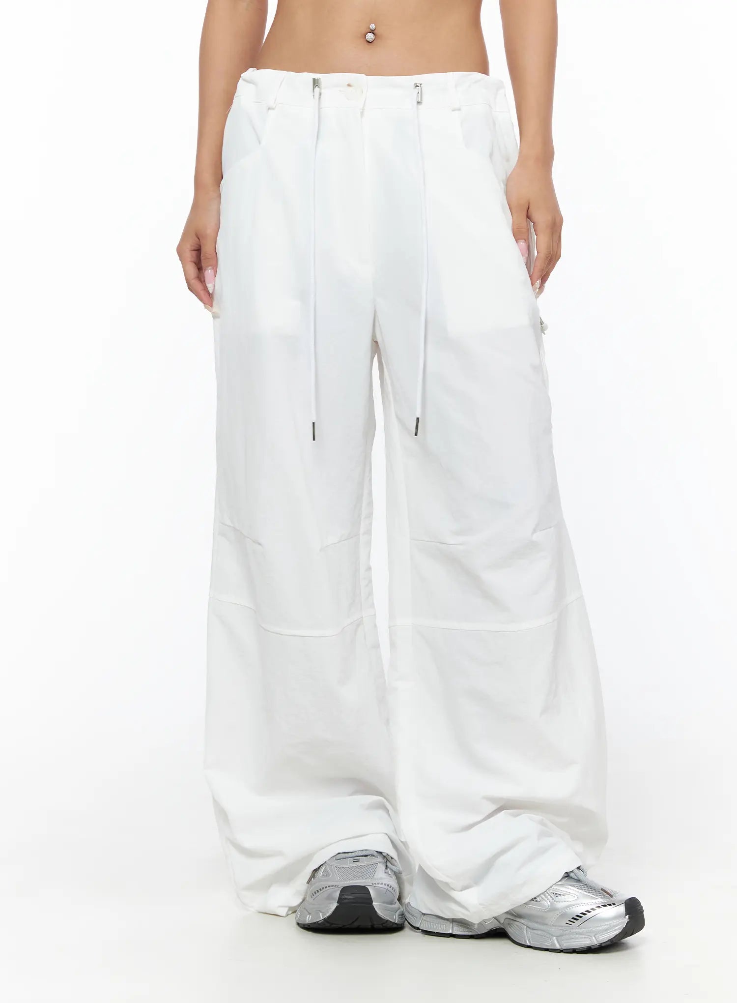 Drawstring Wide Leg Parachute Pants CU524 White front view on model showing full wide leg parachute silhouette with drawstring and zip hardware and sneakers