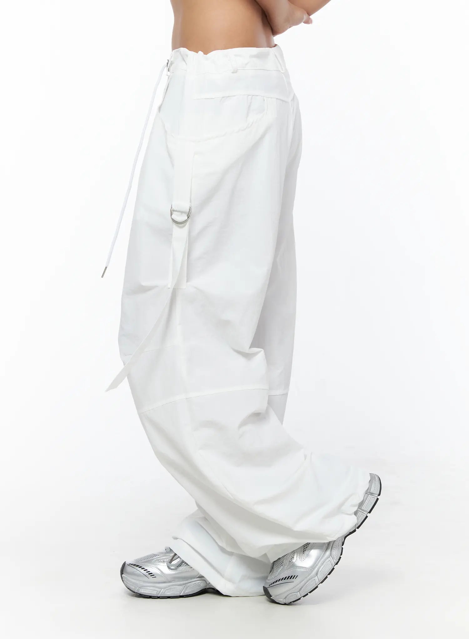 Drawstring Wide Leg Parachute Pants CU524 White side view on model showing D-ring strap hardware wide leg silhouette and nylon texture with silver sneakers