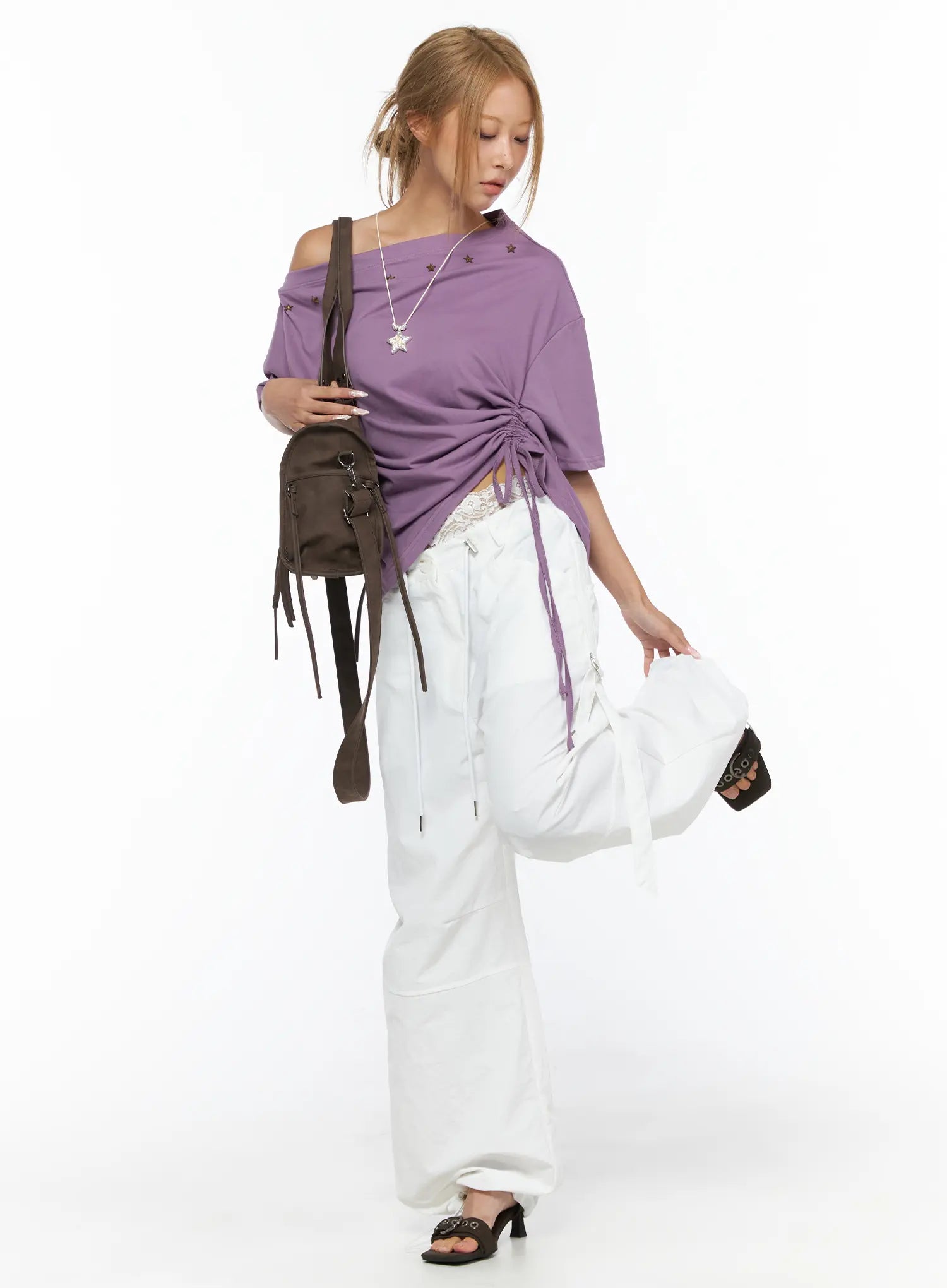 Drawstring Wide Leg Parachute Pants CU524 White full-body styling shot on model wearing purple top and brown bag with leg raised dynamic pose