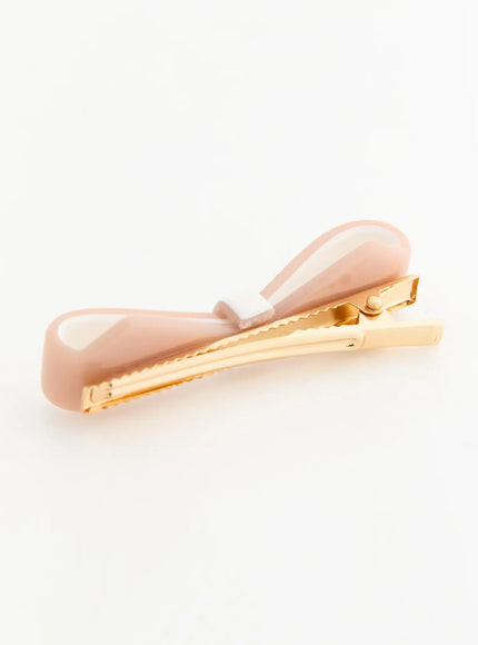 Eden Mix Ribbon Hair Clip IL503 pink side close-up showing glossy resin bow and gold alligator clip serrated edge detail