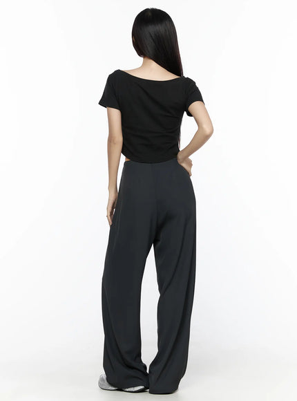 Elastic Waist Relaxed Pants CL524 Dark gray back shot on model showing smooth waistband and wide-leg silhouette, styled with black crop tee and sneakers