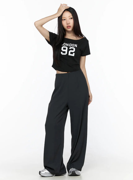 Elastic Waist Relaxed Pants CL524 Dark gray full-body front shot on model styled with black London 92 crop tee and silver sneakers, relaxed wide-leg fit