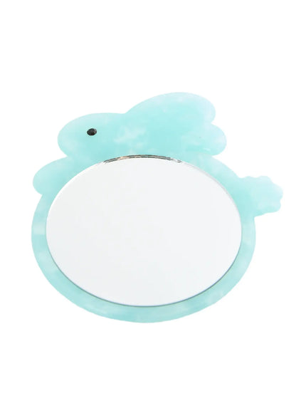 Elsie Compact Mirror IL503 Mint slightly elevated front view displaying round mirror surface and translucent mint rabbit silhouette frame
