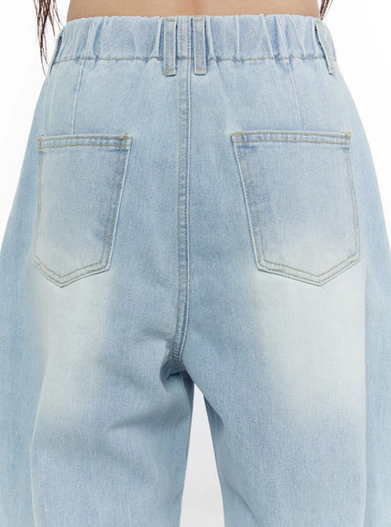 Elunie Washed Wide Leg Jeans CL507 light blue close-up back detail showing elastic waistband, back pockets with contrast stitching, and faded denim