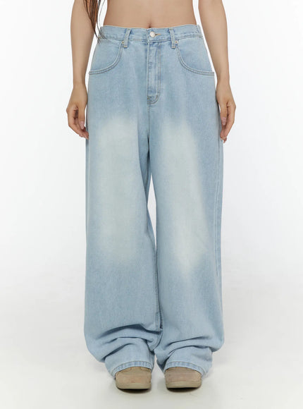 Elunie Washed Wide Leg Jeans CL507 light blue front view on model cropped at waist showing wide-leg fit, faded wash, and front pocket detailing