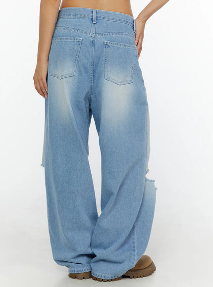Elvin Low Rise Baggy Ripped Jeans CL515 Light blue back shot on model showing dual patch pockets low rise waist wide leg hem pooling at boots