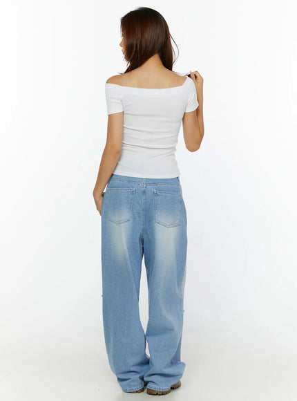 Elvin Low Rise Baggy Ripped Jeans CL515 Light blue back full-body shot on model with white off-shoulder top showing faded wash and ripped knee detail