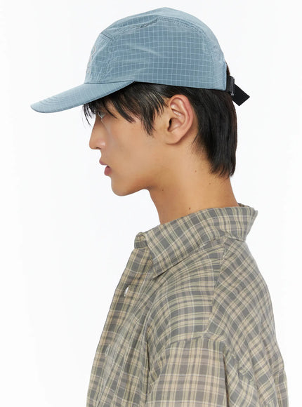 Embroidered Outdoor Cap IL520 Blue side profile model close-up showing structured silhouette brim shape and black buckle strap adjuster
