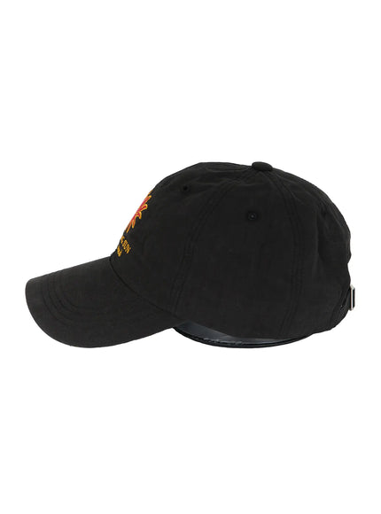 Embroidered Sun Logo Cap IL515 Black side hanger shot showing brim profile silver buckle strap and soft washed cotton texture