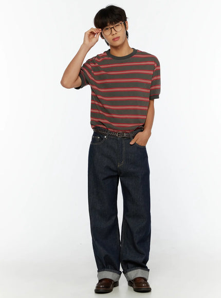Emil Dark-Wash Straight-Leg Jeans IL515 Dark blue full-body front shot on male model adjusting glasses styled with striped tee belt and brown loafers