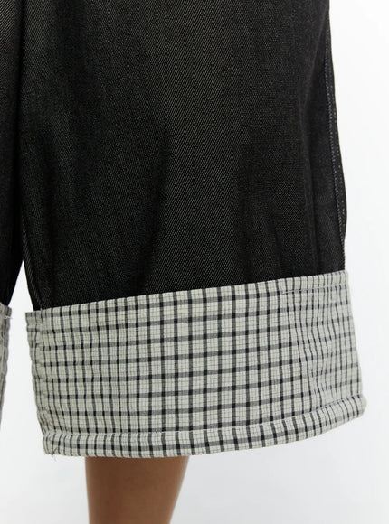 Esmé Gingham Cuff Jean Shorts CL515 Black close-up detail of wide gingham cuffed hem showing contrast fabric texture and denim body