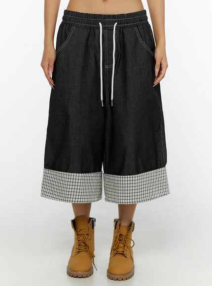 Esmé Gingham Cuff Jean Shorts CL515 Black front close-up on model showing elastic drawstring waist and wide-leg denim silhouette