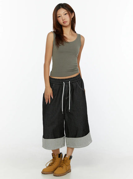 Esmé Gingham Cuff Jean Shorts CL515 Black full-length front view on model in olive tank top and tan boots standing straight