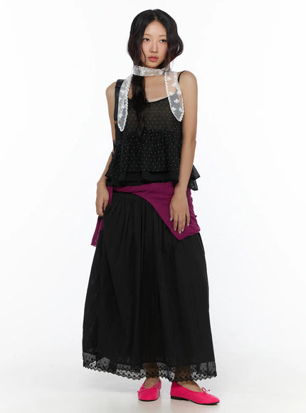 Eyelet Lace Flared Long Skirt CL510 Black full-length front model shot styled with lace scarf, dotted top, and magenta knit tied at waist with pink flats