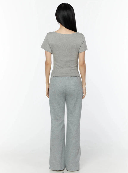 Flare Sweatpants IU524 Gray back shot on model in gray matching set showing rear waistband seam and flared hem detail