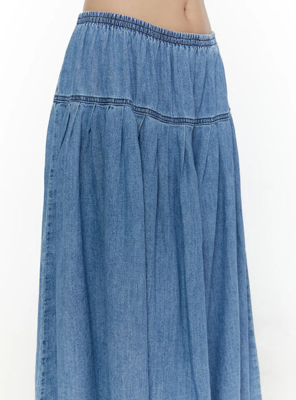 Flared Denim Maxi Skirt CL508 Blue close-up detail of elastic waistband and topstitched yoke seam with pleated denim texture
