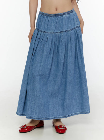 Flared Denim Maxi Skirt CL508 Blue front shot on model showing elastic waist, pleated tiered skirt and full maxi hem