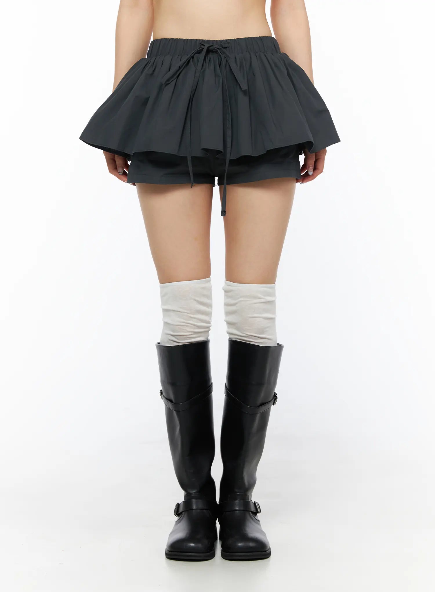 LEWKIN Flared Mini Skort CL501 Dark gray front view on model wearing black knee-high boots and white socks, layered ruffle skort with drawstring waist