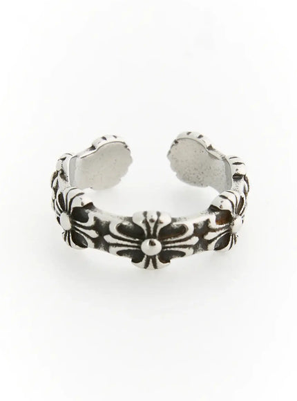 Flora Flower Cross Ring IL517 silver angled top view open cuff band with embossed floral cross motif and darkened antiqued silver texture