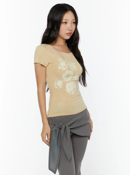 Floral Graphic Tee CU526 Yellow close-up angled front model shot highlighting cream floral butterfly print scoop neckline and slim ribbed fabric texture