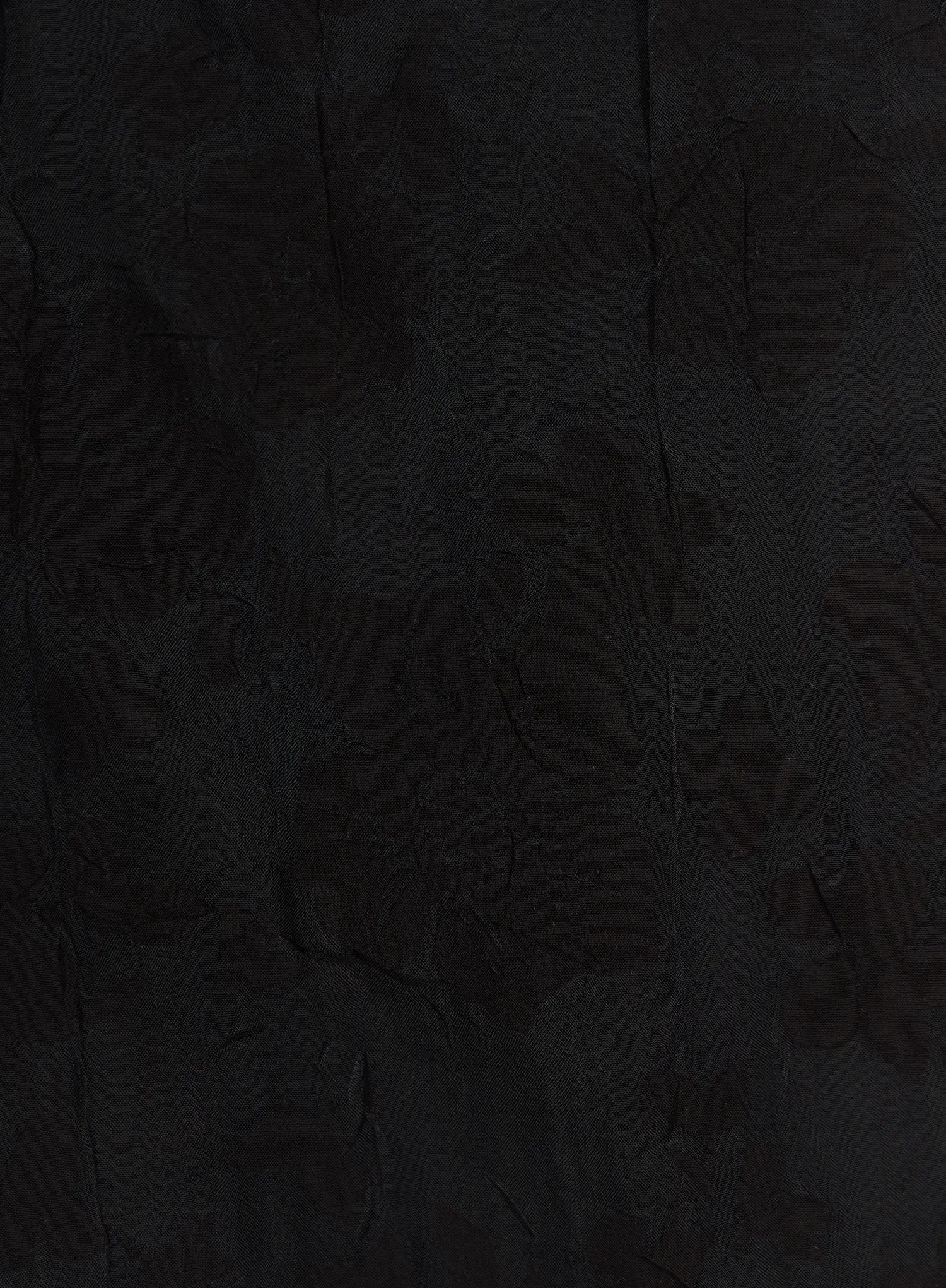 Floral Midi Skirt CU523 Black close-up fabric detail shot showing tonal floral jacquard pattern on dark woven textured material