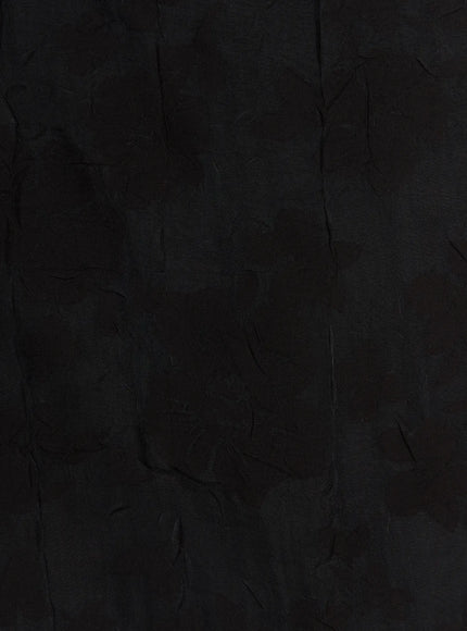 Floral Midi Skirt CU523 Black close-up fabric detail shot showing tonal floral jacquard pattern on dark woven textured material