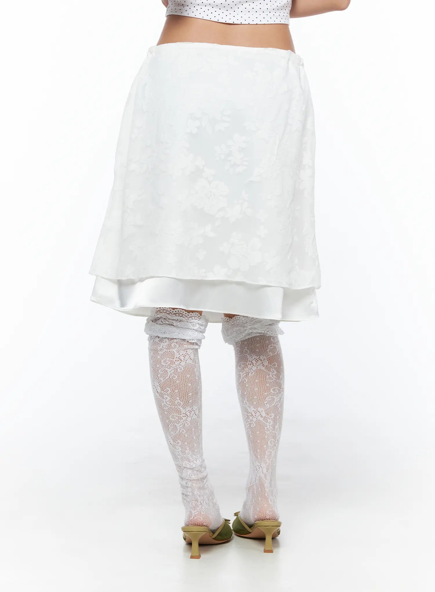 Floral Midi Skirt CU523 White back shot on model showing A-line floral jacquard skirt with double-layer hem and lace thigh-high stocking styling