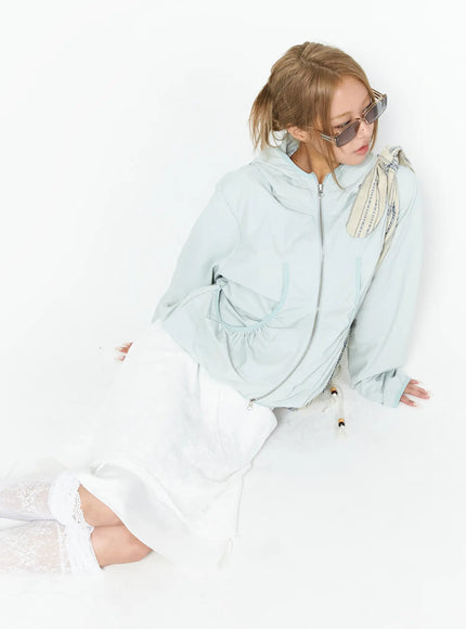 Floral Midi Skirt CU523 White S/M overhead styled shot on seated model wearing mint jacket with lace knee-high socks and white sneakers