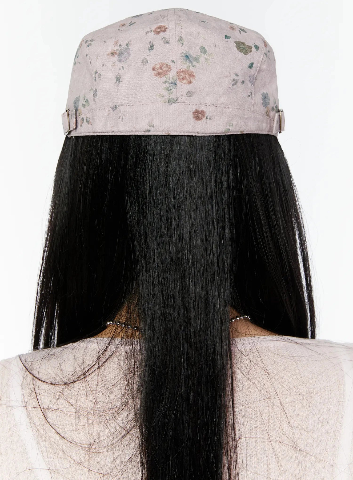 Floral Print Flat Cap IU524 Pink back model shot showing gold adjustable buckle strap and full floral print on crown