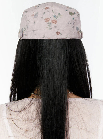 Floral Print Flat Cap IU524 Pink back model shot showing gold adjustable buckle strap and full floral print on crown