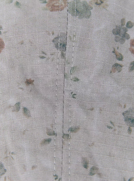 Floral Print Flat Cap IU524 Pink extreme close-up of crown interior seam stitching and linen-blend floral print fabric texture