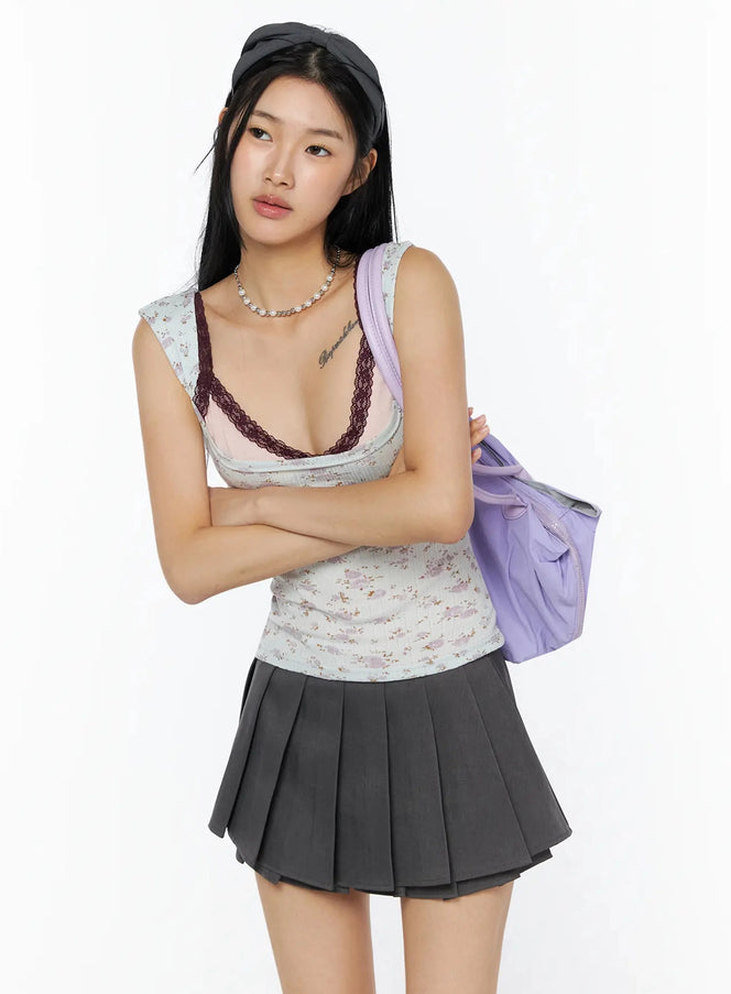 LEWKIN Floral Square Neck Tank Top IL509 Light blue S/M front model shot arms crossed wearing with grey pleated mini skirt and purple shoulder bag