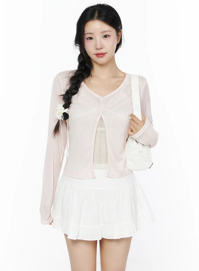 LEWKIN Flower Button Ribbed Cardigan IU525 Light pink front model shot waist-up with braided hair styled over lace top and white mini skirt with shoulder bag size S/M