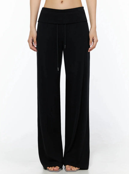 LEWKIN Fold-Over Drawstring Sweatpants IL509 Black front view on model size S/M cropped shot showing fold-over waistband and drawstring detail