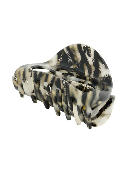 Freya Hair Clip IL503 black marble side angle view showing inner claw teeth fanned open with gold-tone spring hardware detail