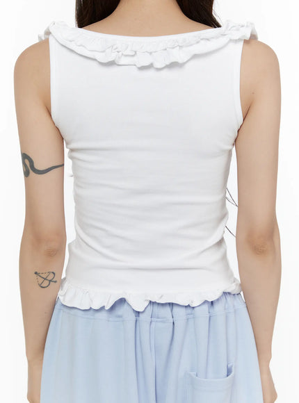 Frill Button Sleeveless Top CL507 White back view on model close-up showing clean ribbed fabric, ruffled neckline reverse and scalloped hem trim