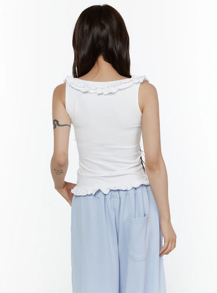 Frill Button Sleeveless Top CL507 White back view on model full torso showing ribbed stretch back panel, ruffle collar back and lettuce-edge hem