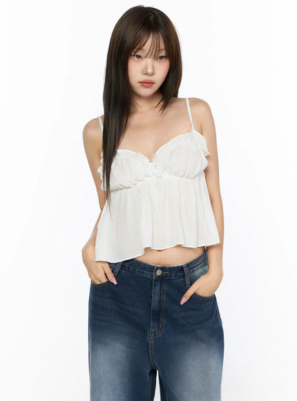 Frill Sweetheart Blouse Tank Top CL514 White front shot on model with hands in pockets showing ruffled sweetheart neckline gathered empire waist and lightweight flowy cropped fabric