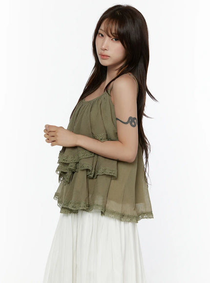 Frill Tiered Lace Sleeveless Top CL507 Dark green side-angle shot on model highlighting flowy tiered layers and lace trim with spaghetti straps