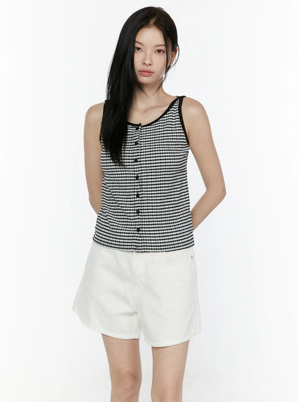 Gingham Tank Top IL506 Black front view on model wearing white shorts, black and white gingham check seersucker fabric with center button placket and black contrast trim