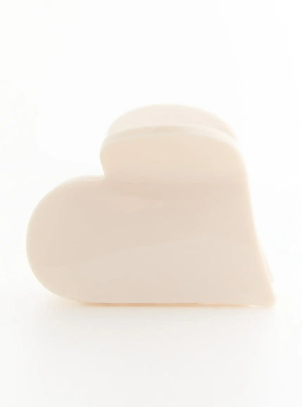Grace Heart Hair Clip IL503 Cream side close-up of heart-shaped claw clip showing soft matte curved silhouette