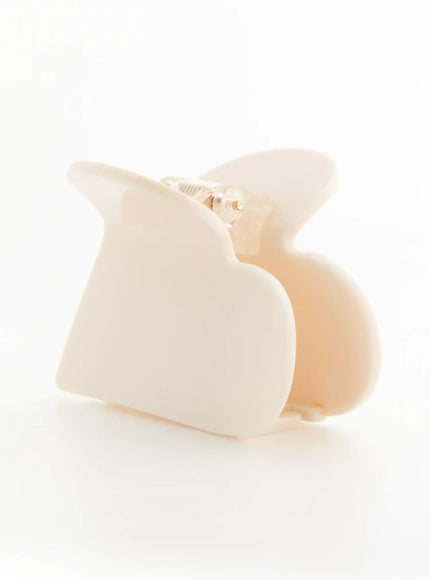 Grace Heart Hair Clip IL503 Cream opposite angle showing heart claw clip open with visible spring hinge from right side