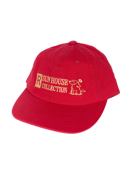 Graphic Baseball Cap IL515 Red front product shot on white background showing full gold embroidered Sun House Collection text and dog graphic detail